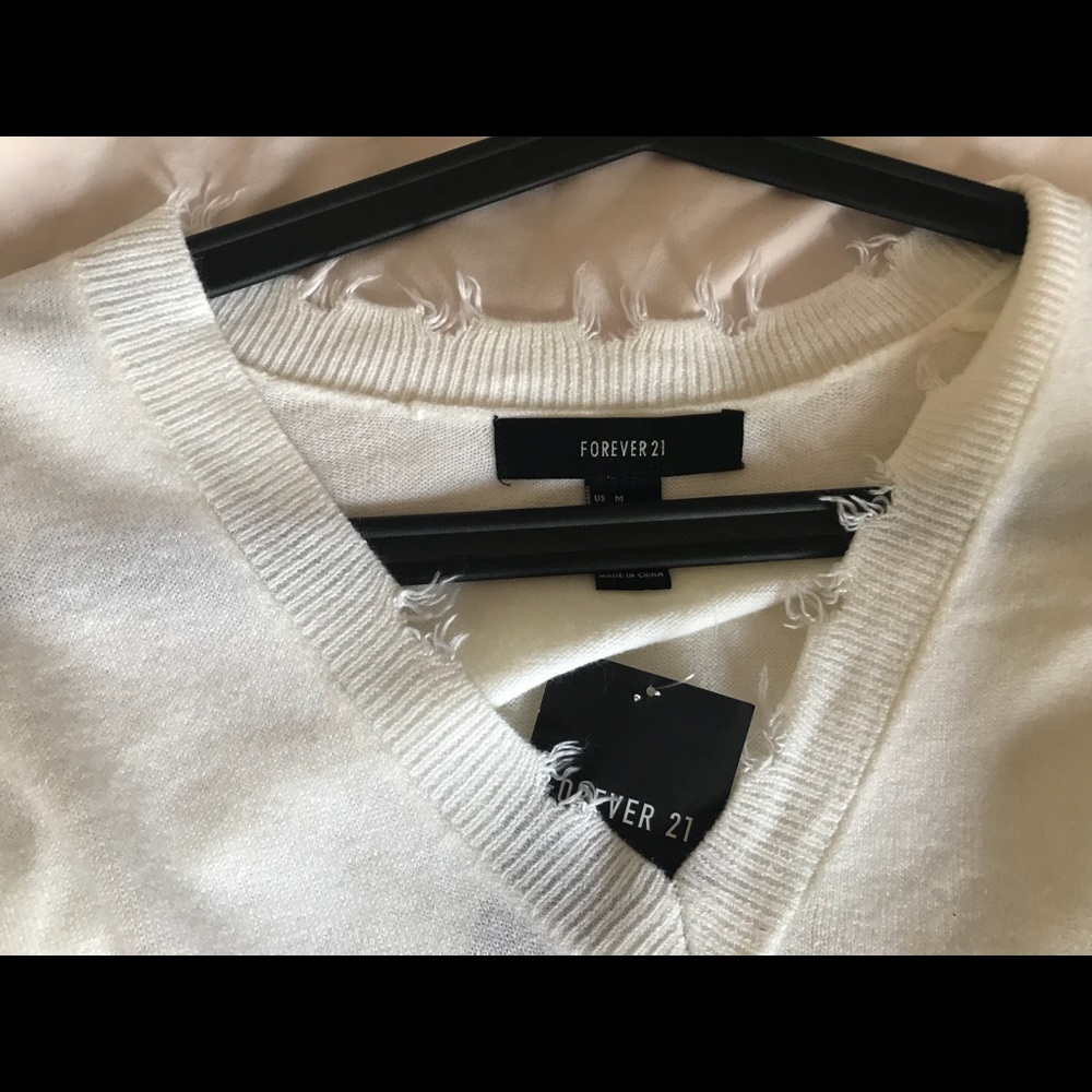 white sweater